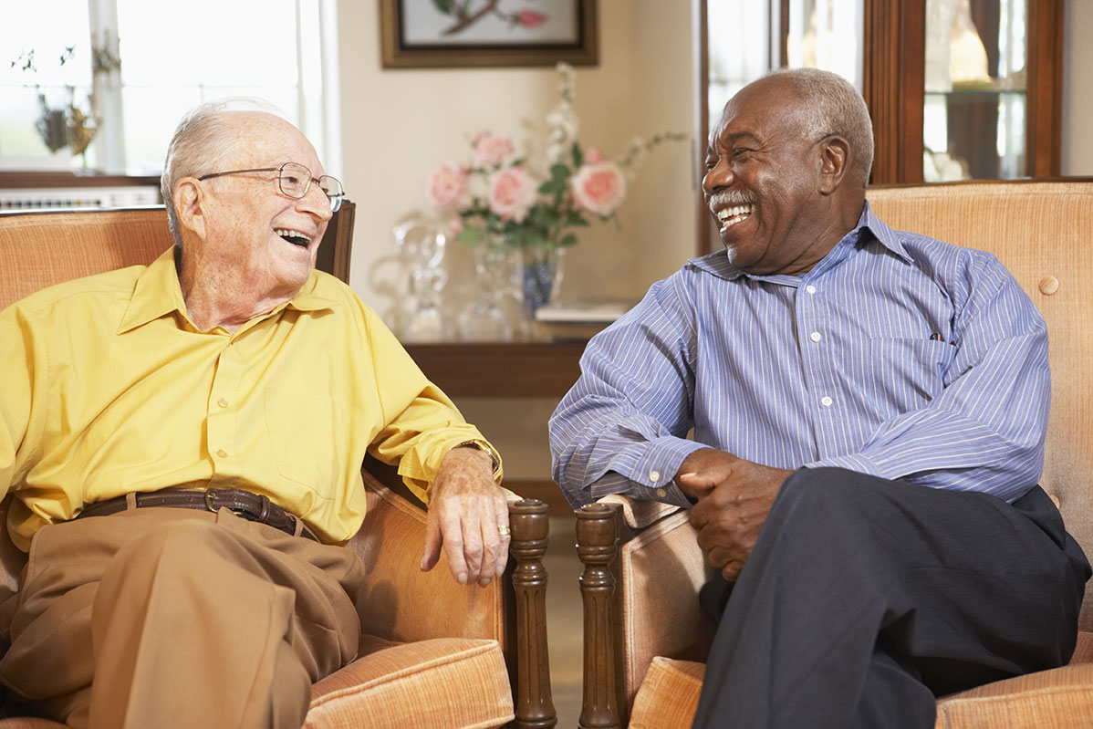 Residents laughing together at Stoneybrook Lodge